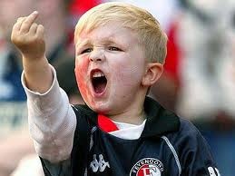 Young football fan middle finger